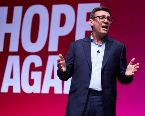 Prime Minister Andrew Burnham addressing the Labour Party Conference in Liverpool